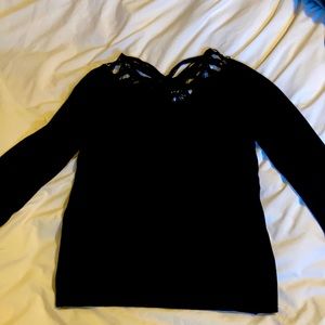 Bloomingdales sweater with cool geometric detail at neck and wrist.